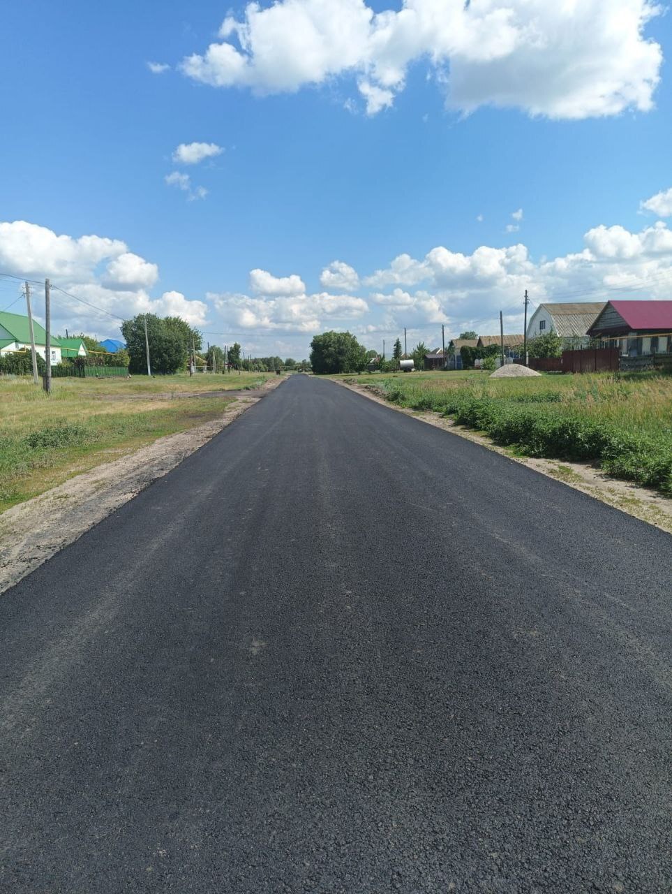 В Воскресеновке дорожные службы завершают ремонтные работы автодороги по улице Советская.
